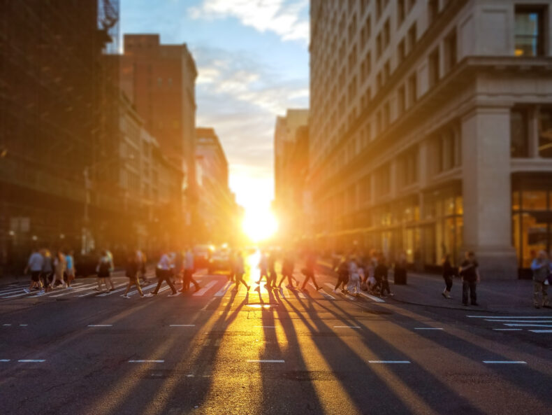 an experienced pedestrian accident lawyer can help pedestrians crossing the street during sunset recover medical expenses