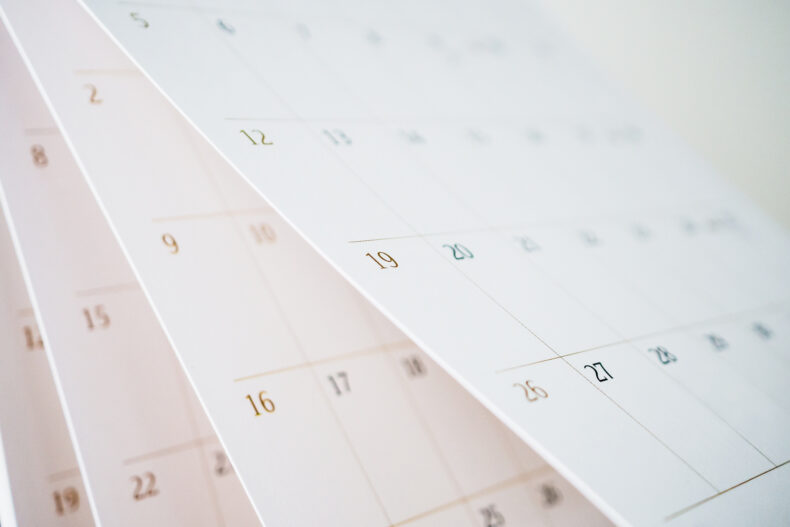 close up of a white calendar that a personal injury law firm with experienced legal team work with