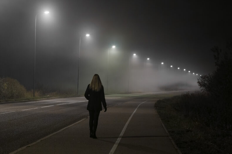 pedestrian wearing dark clothing at night