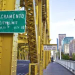 A city limit sign on the Tower Bridge, marks the boundary of the city of Sacramento, California. where Sacramento pedestrian accidents cause serious injuries